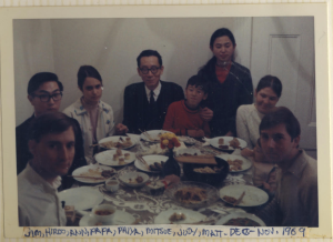 Michio Kushi with his child and students, 1969